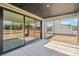 Covered screened-in porch offers great outdoor living, with views of the yard and surrounding neighborhood at 604 Hyder Trl, Tega Cay, SC 29708