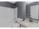 Clean bathroom with granite countertop and shower/tub combo at 700 Leonard Ave, Kannapolis, NC 28081