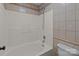 Clean bathroom with a shower/tub combo and updated tile at 700 Leonard Ave, Kannapolis, NC 28081