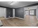 Open dining area with hardwood floors and access to kitchen at 700 Leonard Ave, Kannapolis, NC 28081