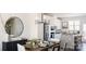 Bright dining area with farmhouse table and modern chandelier at 8018 Elevate Ct, Charlotte, NC 28205