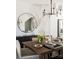 Bright dining room with a wooden table and modern chandelier at 8018 Elevate Ct, Charlotte, NC 28205