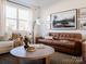 Living room with a comfortable couch and coffee table at 8018 Elevate Ct, Charlotte, NC 28205