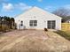 Home's backyard with patio and fenced-in area at 8035 Bristle Ln, Charlotte, NC 28214