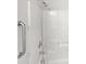 Clean bathroom with a shower/tub combo and grab bar at 8035 Bristle Ln, Charlotte, NC 28214