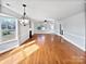 Spacious living room with hardwood floors and lots of natural light at 8035 Bristle Ln, Charlotte, NC 28214