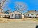 A detached garage alongside a bungalow style home, providing ample storage at 85 5Th St, Cramerton, NC 28032