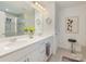 Bathroom with double vanity, large mirror, and walk-in shower at 8903 Ansley Park Pl, Huntersville, NC 28078