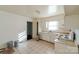 Basic kitchen with white cabinets and an electric stove at 10006 Feldbank Dr, Charlotte, NC 28216