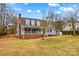 Charming blue two-story home featuring a welcoming front porch and dormer windows at 111 Wheaton Ct, Salisbury, NC 28147