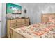 Bedroom with dresser, double bed, and wall-mounted TV at 11627 Tribal Dr, Charlotte, NC 28214