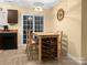 Kitchen features a breakfast bar and a sliding glass door at 11627 Tribal Dr, Charlotte, NC 28214