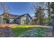 Spacious backyard with a patio, shed, and fenced area at 1204 Buchanan St, Charlotte, NC 28203