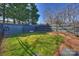 Landscaped backyard with shed and privacy fence at 1204 Buchanan St, Charlotte, NC 28203