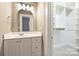 Clean bathroom with updated vanity and walk-in closet at 1204 Buchanan St, Charlotte, NC 28203