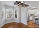 Dining room with hardwood floors and a view into the kitchen at 1204 Buchanan St, Charlotte, NC 28203