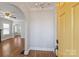 Bright entryway with arched doorway and hardwood floors at 1204 Buchanan St, Charlotte, NC 28203