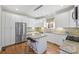 Modern kitchen with stainless steel appliances and granite countertops at 1204 Buchanan St, Charlotte, NC 28203