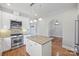 Eat-in kitchen with stainless steel appliances and granite counters at 1204 Buchanan St, Charlotte, NC 28203