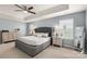 Spacious Primary bedroom with large bed and neutral decor at 1216 Longwall Ln, Matthews, NC 28105