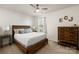 Cozy bedroom with full bed and built-in dresser at 1216 Longwall Ln, Matthews, NC 28105