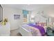 Charming bedroom with a white bed frame and purple bedding at 1384 5Th Street Ne Dr, Hickory, NC 28601