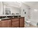 Bathroom with double vanity, granite countertop, and shower/tub combo at 1444 Swaying Branch Ln, Clover, SC 29710