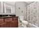 Bathroom with single vanity, shower, and seashell-themed curtain at 1444 Swaying Branch Ln, Clover, SC 29710