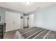 Bedroom with double bed, closet, and access to hallway at 1444 Swaying Branch Ln, Clover, SC 29710