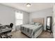 Bedroom with a double bed, desk, and built-in mirror at 1444 Swaying Branch Ln, Clover, SC 29710