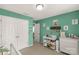 Bedroom with crib, dresser, and closet with double doors at 1444 Swaying Branch Ln, Clover, SC 29710