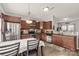 Eat-in kitchen with stainless steel appliances and wood cabinets at 1444 Swaying Branch Ln, Clover, SC 29710