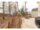 Large concrete patio, partially shaded, with seating area and grill at 1444 Swaying Branch Ln, Clover, SC 29710
