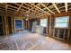 Bright living room with exposed ceiling, three windows, and hardwood floors at 1780 23Rd Avenue Ne Ln, Hickory, NC 28601