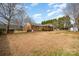 Large backyard with screened porch and plenty of green space at 2222 Fox Hunt Dr, Monroe, NC 28110