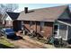 Rear view of house, driveway, and yard at 224 E Steele St, Salisbury, NC 28144