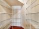 Walk-in closet with multiple rows of wire shelving for maximum storage at 2607 White Pines Ct, Monroe, NC 28112