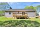 Backyard with a wooden deck perfect for outdoor entertaining and relaxing in the sunshine at 3321 15Th Sw Ave, Hickory, NC 28602