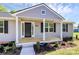 Charming front porch with gray siding and black shutters offering a warm curb appeal at 3321 15Th Sw Ave, Hickory, NC 28602