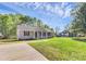Beautiful single-story home with a well-maintained lawn on a sunny day with blue sky background at 3321 15Th Sw Ave, Hickory, NC 28602