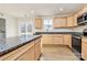 Modern kitchen with granite countertops, stainless steel appliances, and light wood cabinets at 3321 15Th Sw Ave, Hickory, NC 28602