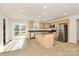 Modern kitchen with island, light cabinets, granite countertops, and stainless steel appliances at 3321 15Th Sw Ave, Hickory, NC 28602