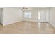 Spacious living room featuring light wood-look floors and a ceiling fan at 3321 15Th Sw Ave, Hickory, NC 28602