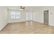 Bright living room with light flooring and ceiling fan at 3321 15Th Sw Ave, Hickory, NC 28602
