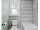 Bathroom with white subway tile and bathtub at 4224 Walker Rd, Rock Hill, SC 29730