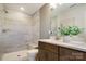 Modern bathroom with double vanity and large shower at 5004 Rill Ct # 37, Charlotte, NC 28262