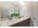 Double vanity bathroom with modern fixtures and ample counter space at 5004 Rill Ct # 37, Charlotte, NC 28262
