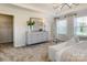 Bright bedroom with dresser, closet, and large windows at 5004 Rill Ct # 37, Charlotte, NC 28262
