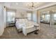 Spacious bedroom with large windows and stylish decor at 5004 Rill Ct # 37, Charlotte, NC 28262
