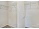 Spacious walk-in closet with wire shelving at 5004 Rill Ct # 37, Charlotte, NC 28262